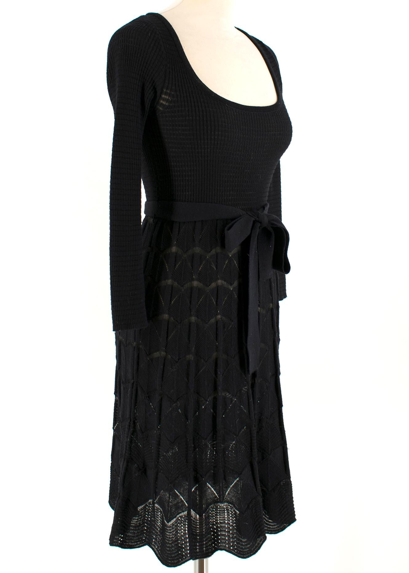 Missoni Black Crotchet Knit-Patterned Stretch Rope Dress

- Black, knit patterned at skirt
- Long-sleeved
- Dipped hem
- Round neck
- Stretched sleeves and bust
- Adustable rope tie at waist

Please note, these items are pre-owned and may show some