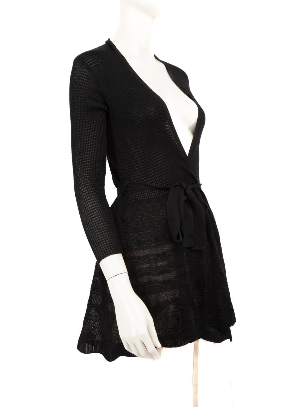 CONDITION is Very Good. Hardly any visible wear to cardigan is evident on this used Missoni designer resale item. Sizing and composition label is missing.

Details


Black

Synthetic

Cardigan

Sheer

Stretchy

Long sleeves

Waist