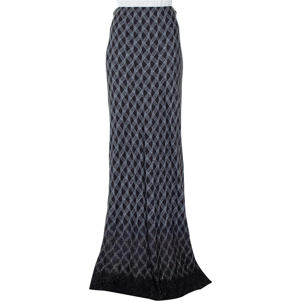 Channel an elegant charm with this maxi skirt from Missoni. The pretty black skirt is made of lurex knit fabric and features a floor-sweeping length. Pair it with a corset top and strappy sandals for a put-together look.

