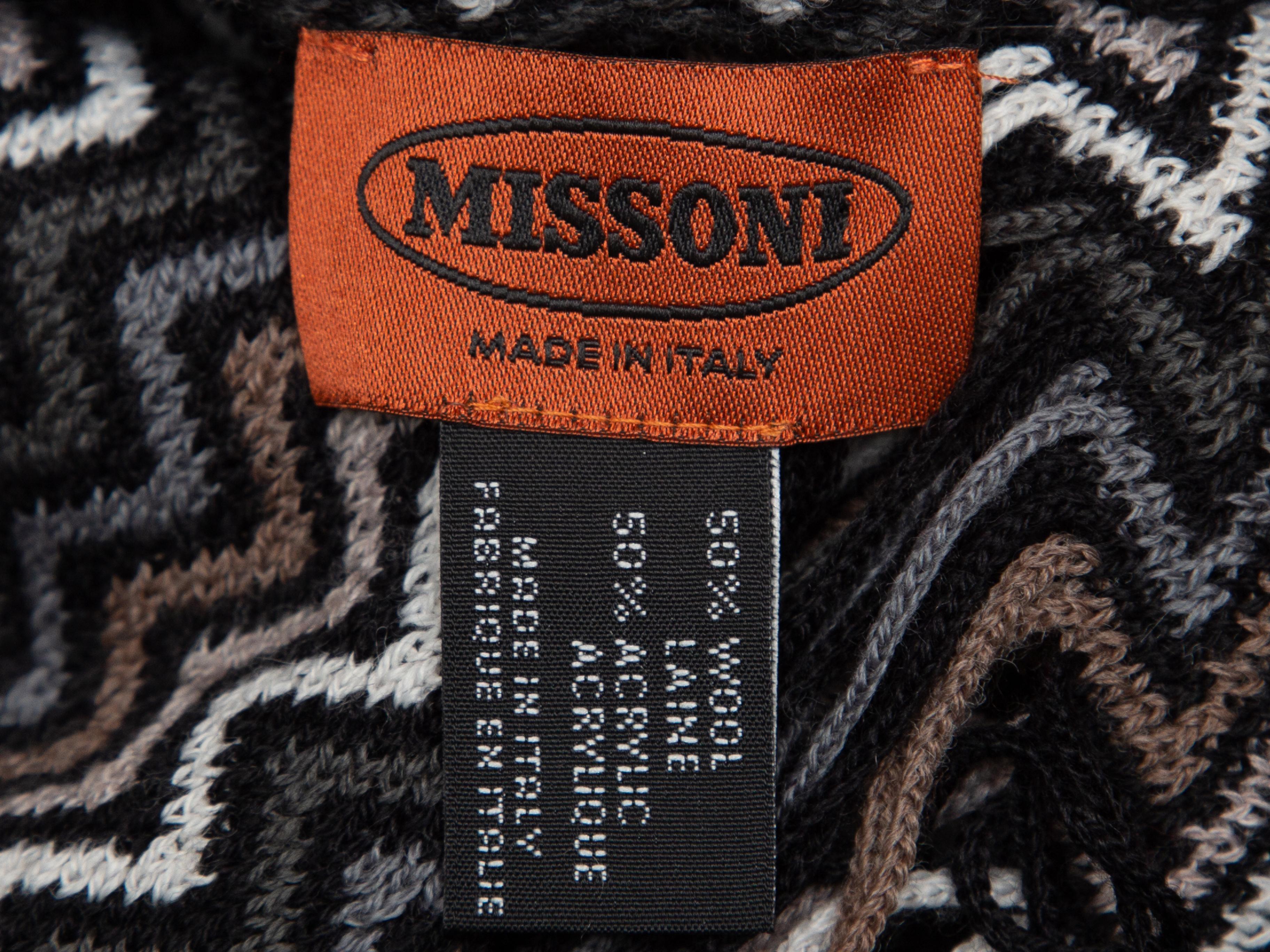 Product details: Black and multicolor wool-blend chevron scarf by Missoni. Fringe trim at ends. 19