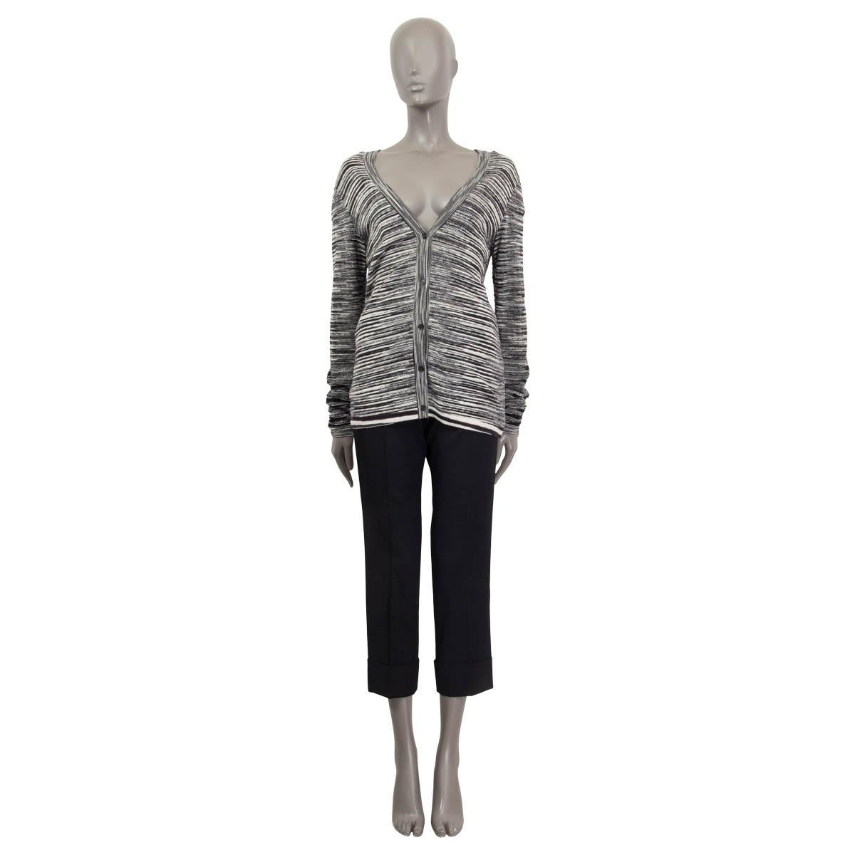 100% authentic Missoni striped knit cardigan in black and white wool (90%) and nylon (10%). Opens with five buttons on the front. Unlined. Has been worn and is in excellent condition.

Measurements
Tag Size	44
Size	L
Shoulder Width	40cm