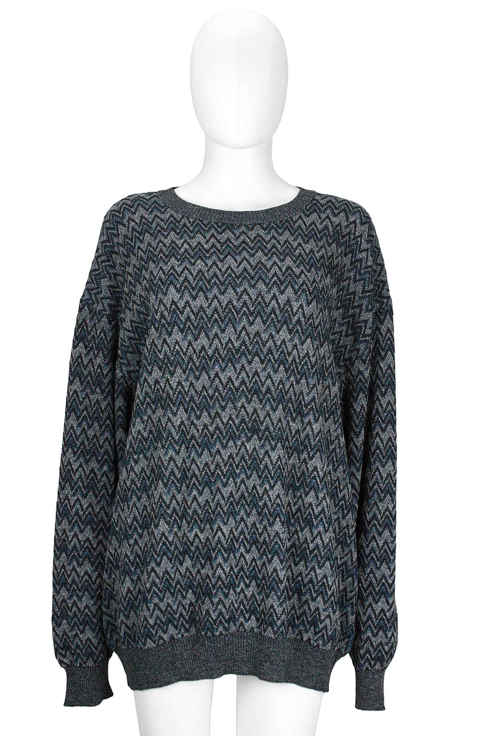 Missoni 
Knit sweater 
Knit stripe trim 
Crew neck 
Light weave that stretches 
Wool blend
Blue grey black zigzag pattern