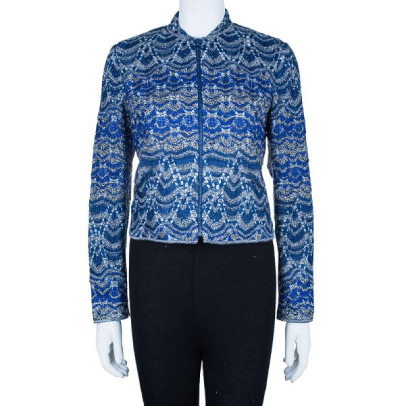This Missoni jacket will give you an architectural yet stylish aesthetic, designed with a Chinese collar and long sleeves. The printed design combines different shades of blue with light beige and white, making a statement. This jacket features a