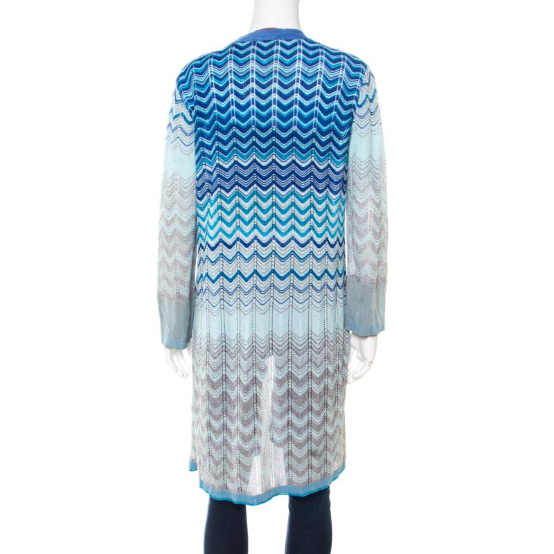 Missoni delights us with this wonderful cardigan. It is knit from quality fabrics and styled as an open front with long sleeves and perforated chevron patterns all over. The cardigan will be a luxurious addition to your closet.

Includes: The Luxury