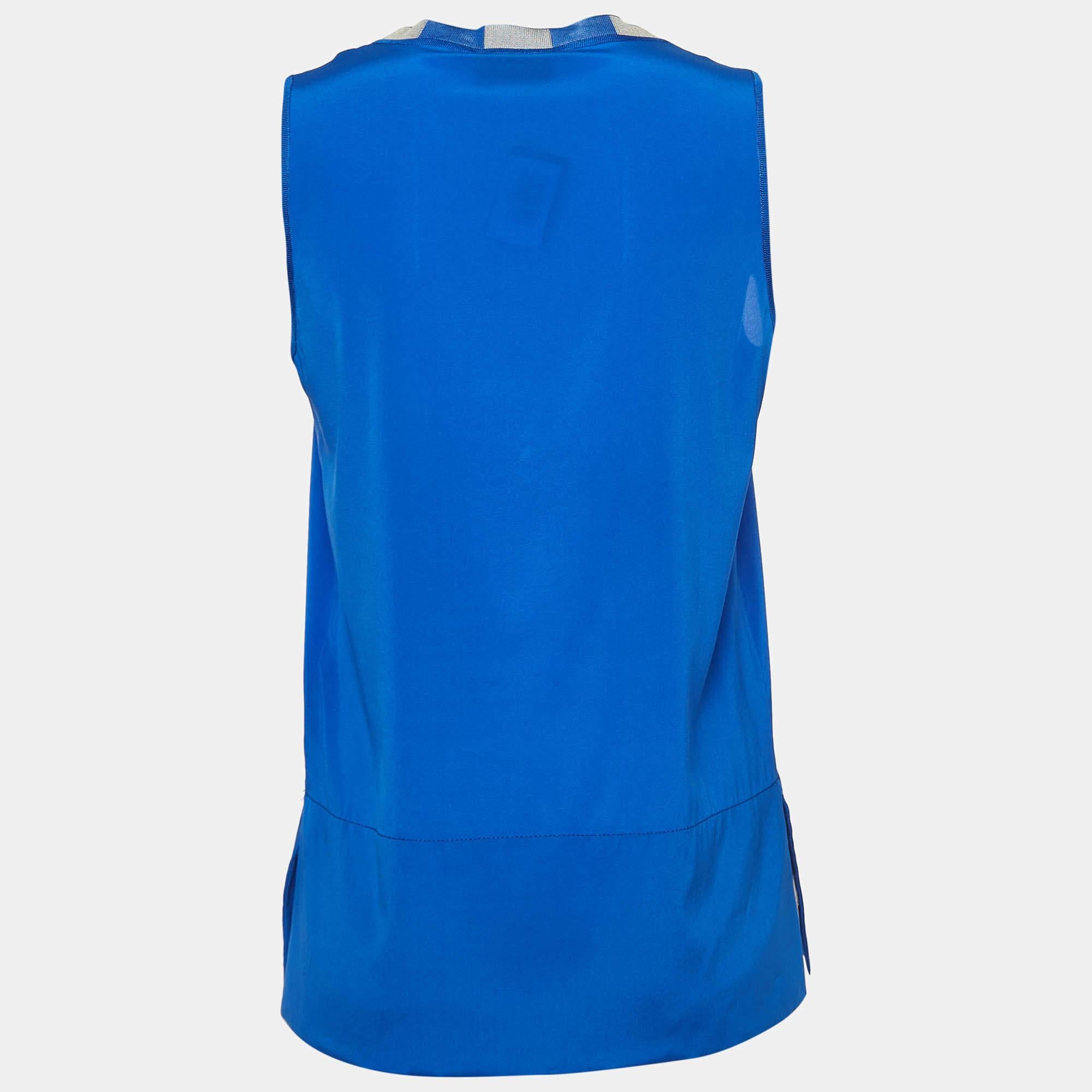 Questo top griffato offre stile e comfort. Realizzata con i migliori tessuti, la creazione è stata curata nei minimi dettagli. Abbinalo a una gonna e a dei tacchi.