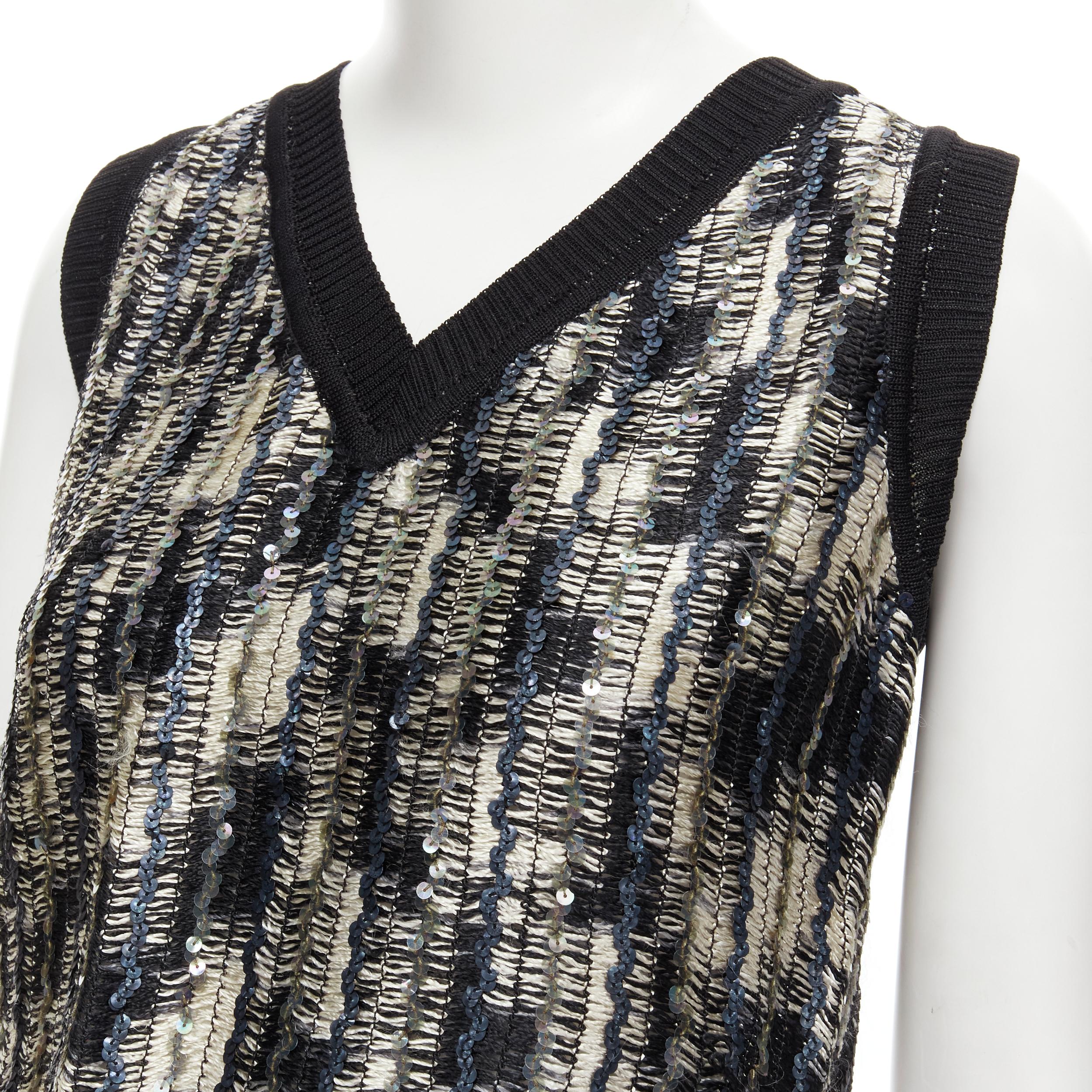 MISSONI blue silver sequins embellished crochet knit cropped vest IT42 M
Reference: GIYG/A00201 
Brand: Missoni 
Material: Rayon 
Color: Grey 
Pattern: Abstract 
Made in: Italy 

CONDITION: 
Condition: Excellent, this item was pre-owned and is in