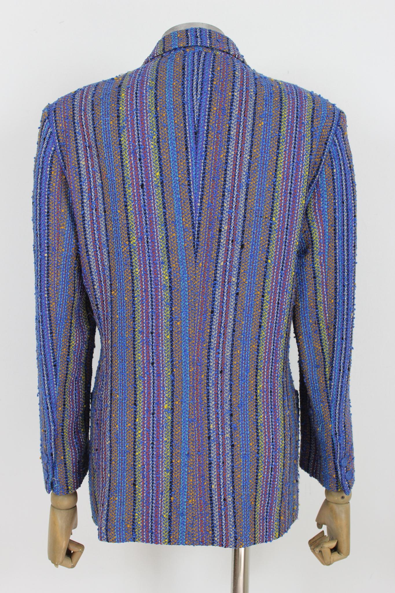 Missoni vintage 90s boucle wool jacket. Classic blue, yellow and red blazer with striped pattern. Internal shoulder straps and one button closure. Fabric 97% wool, 3% polyamide. Made in Italy.

Size: 42 It 8 Us 10 Uk

Shoulder: 46 cm
Bust / Chest: