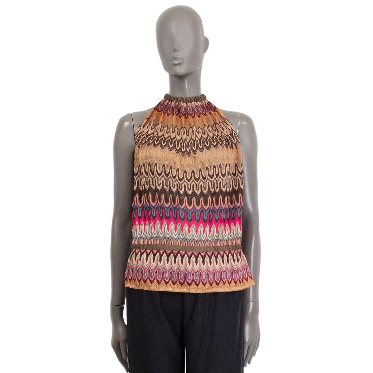 100% authentic Missoni halter-neck sheer knit top in pink, nude, brown, beige, petrol and turquoise viscose (100%). Ties around the neck and on the back. Unlined. Has a elastic drawstring around the waist. Has been worn and is in excellent