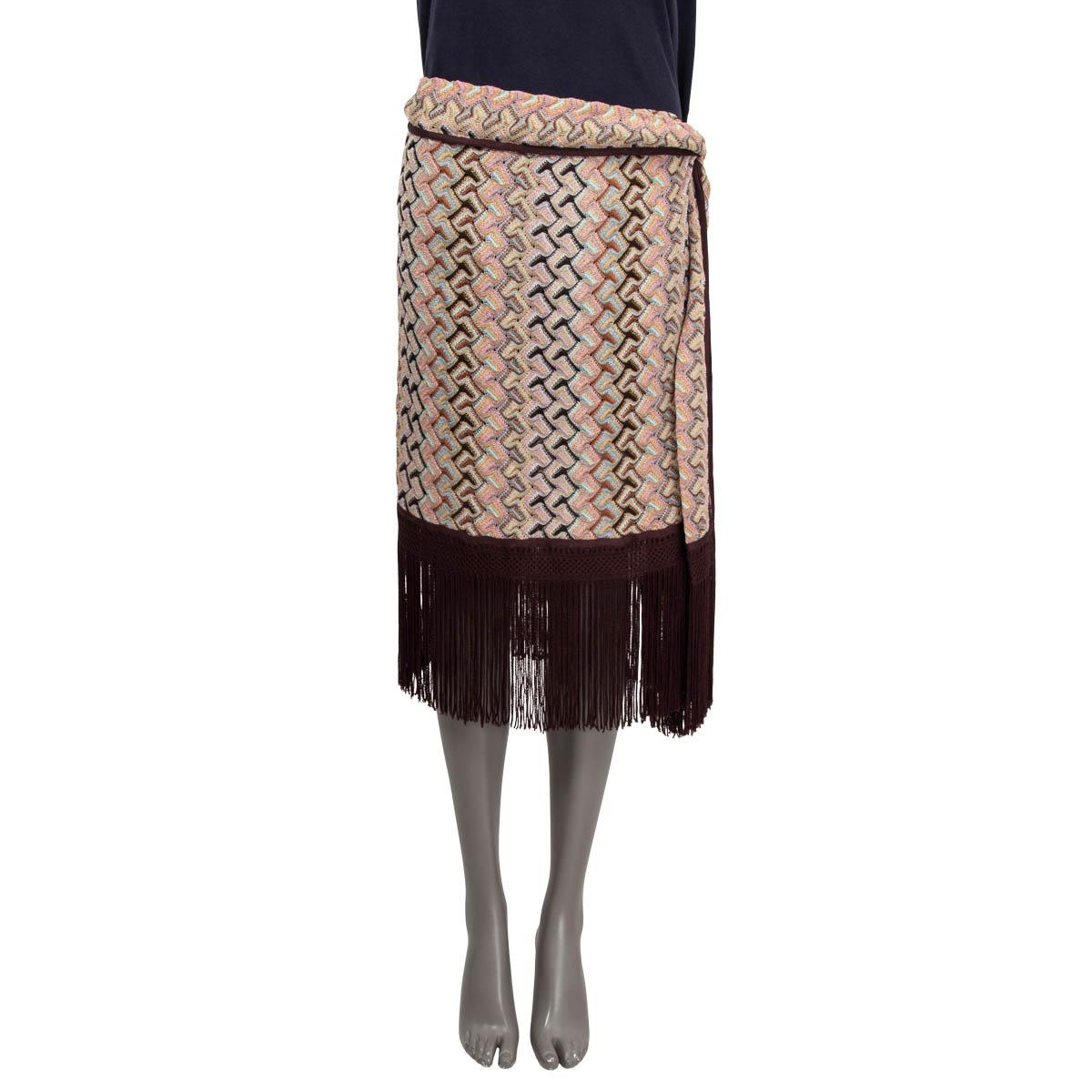 100% authentic Missoni side-tie knit skirt in chocolate brown and multicolor viscose (64%) and cupro ( 23%) and polyester. Features long fringes along the hems. Closes with a zipper on the side and is lined in polyester (100%) Has been worn and in