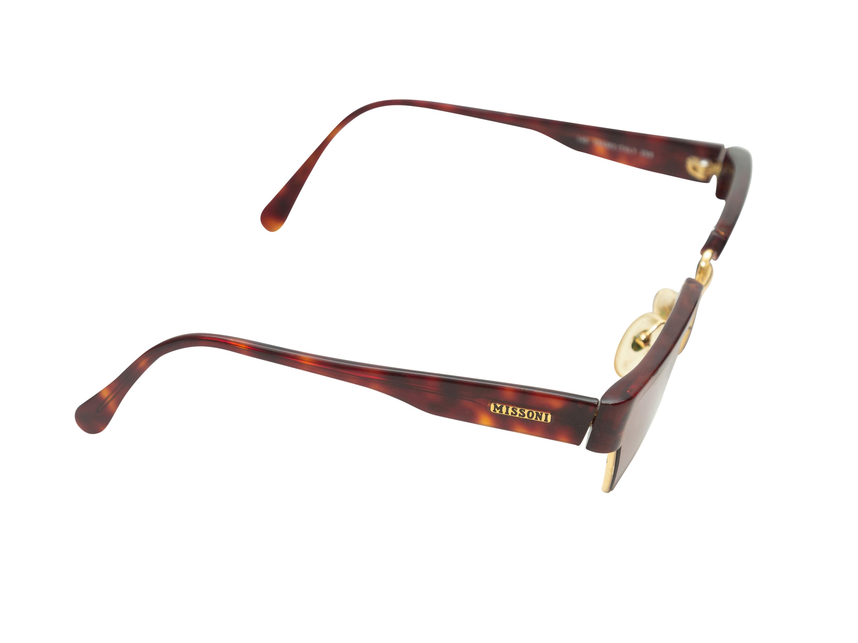 Product Details: Vintage brown tortoiseshell and gold-tone metal prescription sunglasses by Missoni. Brown tinted lenses.
Condition: Pre-owned. Good. Minor scratches at lenses.
