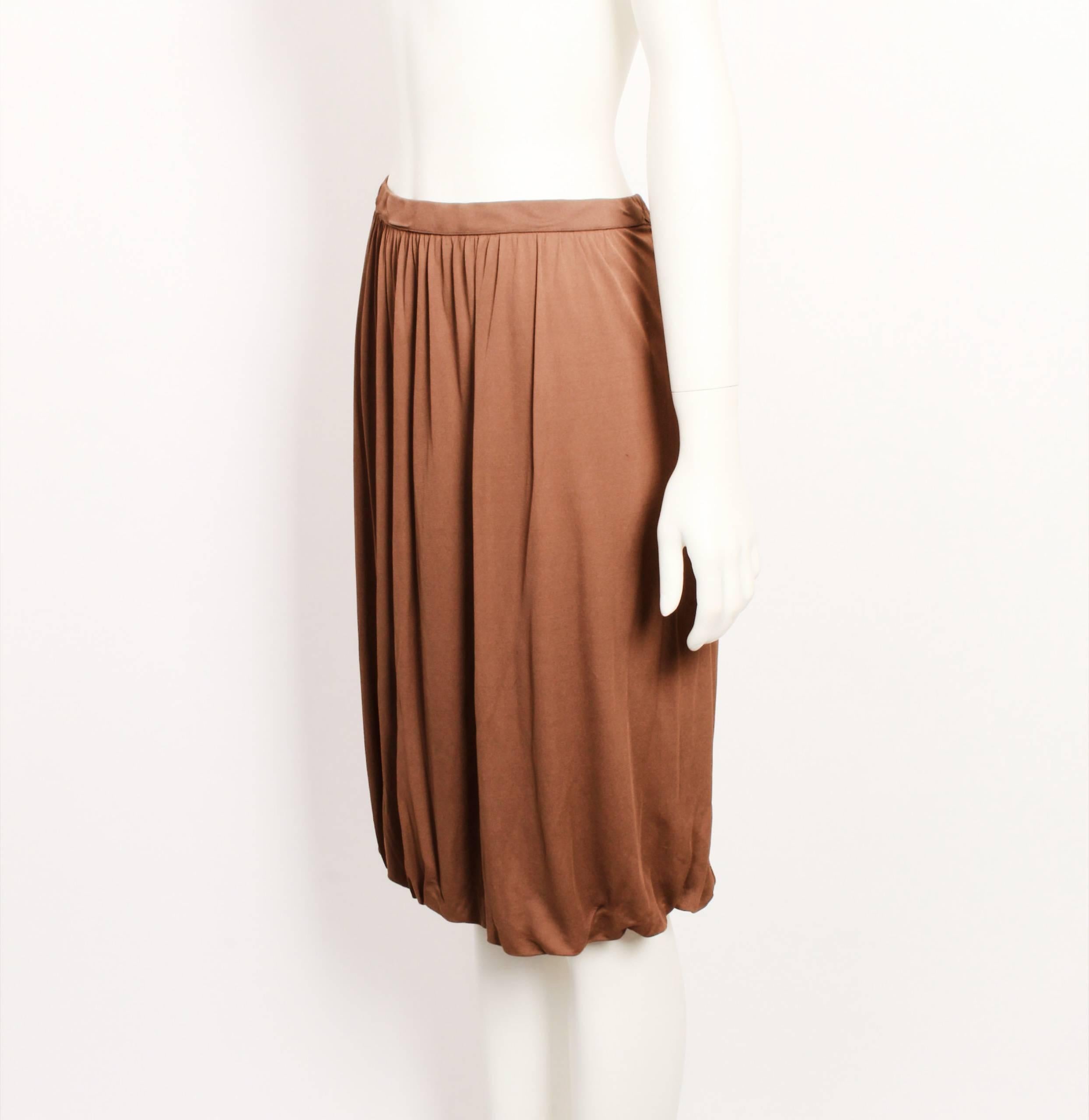 Cute Missoni caramel soft rayon knit bubble skirt from the E07 Estate / Summer 2007 Collection.
Fully lined with elasticated waistline. Measurements are taken with garment flat and un- stretched. Original tag still attached. 
