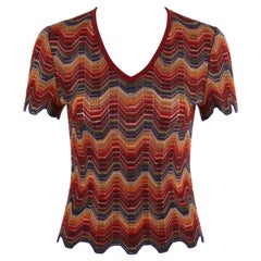 MISSONI - Haut à manches courtes en maille de laine extensible multicolore avec col en V rayé, circa 1970