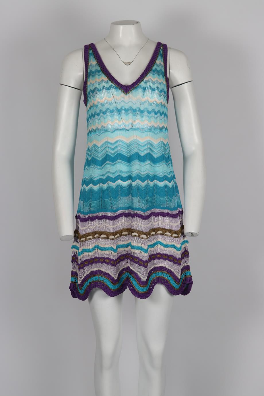 Missoni Crochet Knit Mini Dress. Purple, blue and white. Sleeveless. V-Neck. Slips on. 45% Cotton, 27% viscose, 16% linen, 10% silk, 2% nylon. IT 40 (UK 8, US 4, FR 36). Bust: 33.1 in. Waist: 32.6 in. Hips: 37.2 in. Length: 28 in. Condition: Used.