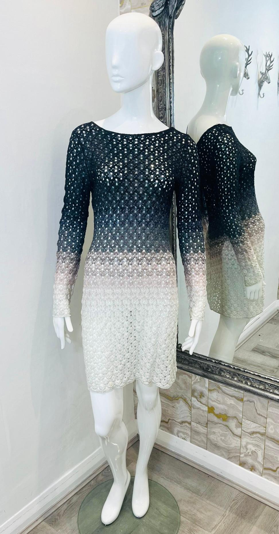 Missoni Crochet Knit Ombre Dress

Mini dress designed with ombre effect in the shades of black, grey, pale pink and white.

Detailed with round neckline to the front and V-Neck to rear.

Featuring fitted silhouette and long sleeves.

Size –