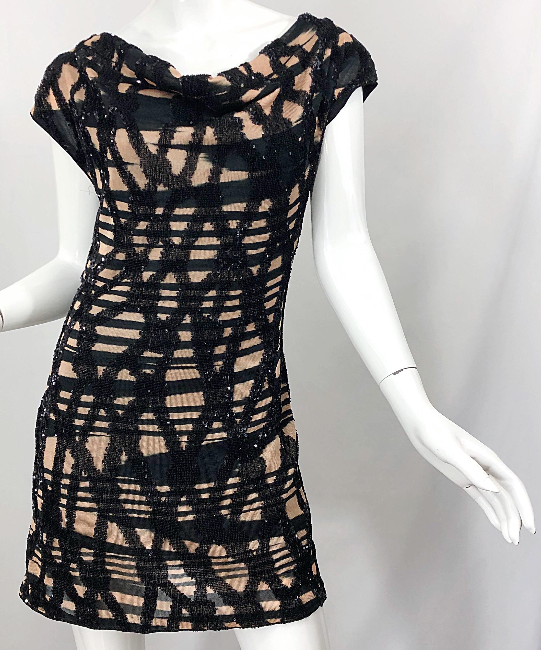 Chic early 2000s MISSONI Orange Label black and nude sequined abstract mini dress! Features signature Missoni knit jersey with an attached slip lining. Flattering striped abstract design with thousands of hand-sewn black sequins in a variety of