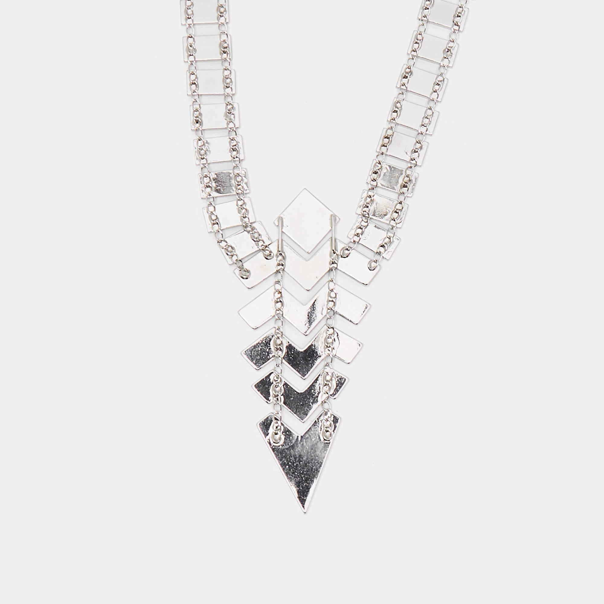 Missoni's statement necklace has a play of geometric shapes and gorgeous enamel work. Made from silver-tone metal, the long necklace is designed to beautifully grace any neckline with a distinct touch of luxury.

Includes: Original Box, Price Tag

