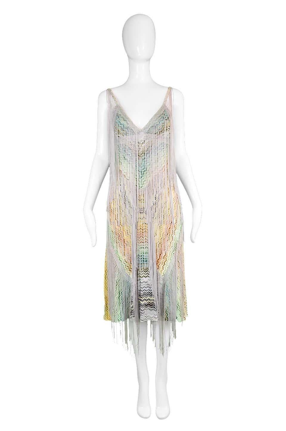 Missoni Runway Multi Color Fringe & Crochet Knit Dress

Estimated Modern Size: UK 8-10/ US 4-6/ EU 36-38. Please click 'Continue Reading' below to see full measurements and description.
Bust - 32” / 81cm
Waist - 28” / 71cm
Hips - 36” / 91cm
Length