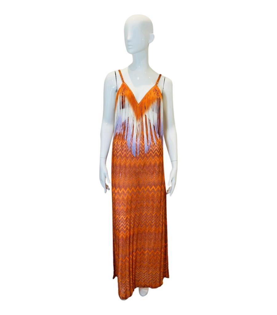 Missoni Fringe Detailed Knitted Summer Dress
Orange sleeveless dress with signature chevron design and dyed fringing falling from around the neckline.
Featuring side cut-outs creating open back with centre strap closure and maxi length.
Size –