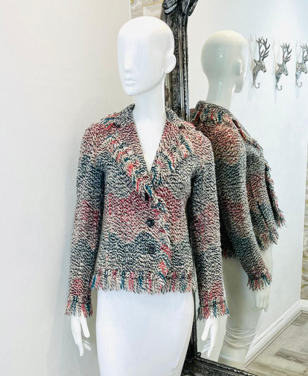 Missoni Fringe Trimmed Wool Jacket

Multicoloured knitted jacket designed with fringe trims.

Detailed with button centre closure, notched collar and slit pockets at waist.

Size – 40IT

Condition – Very Good

Composition – 95% Wool, 5% Nylon