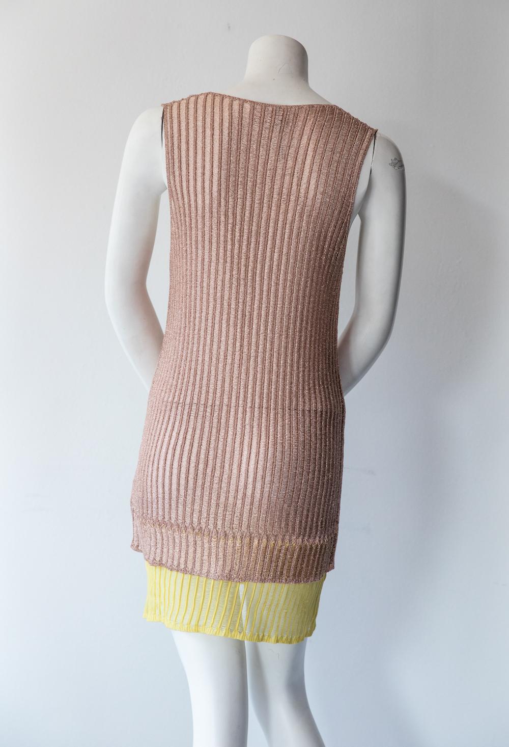 Missoni rose gold knit mini dress. This semi-sheer dress is sleeveless, and has a v-neck with yellow and gold color-blocking at the mid-thigh to create a layered effect. 
Great for resort dressing. 

Size IT 42 / US 6