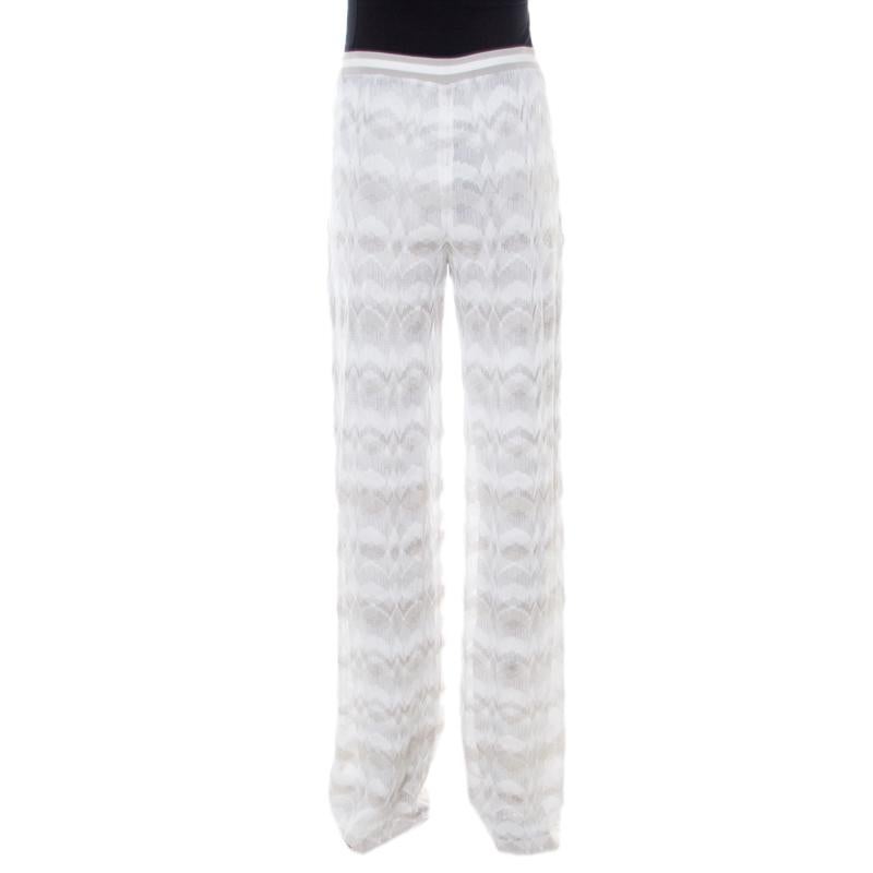 Everything about these Missoni pants speaks comfort and ease. They have been knit in patterns of grey and white and shaped into wide legs. Wear them with a long white blouse and flat slides for a relaxed ensemble.

Includes: The Luxury Closet