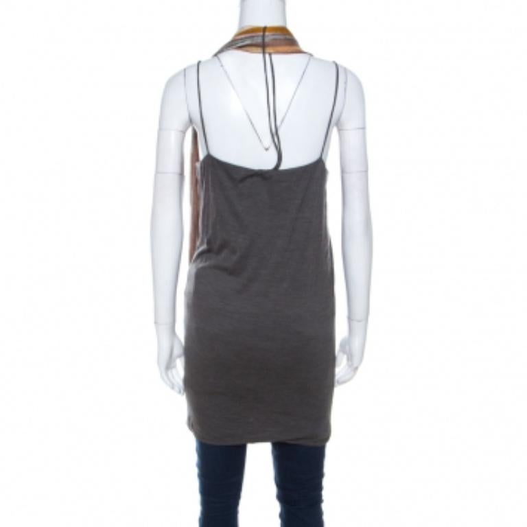 This amazing top is from Missoni. This grey piece is an absolute stunner that pairs well with any outfit variation you are looking for. It has noodle straps and a multicolor cowl neck detail. The top is stylish and comfortable.