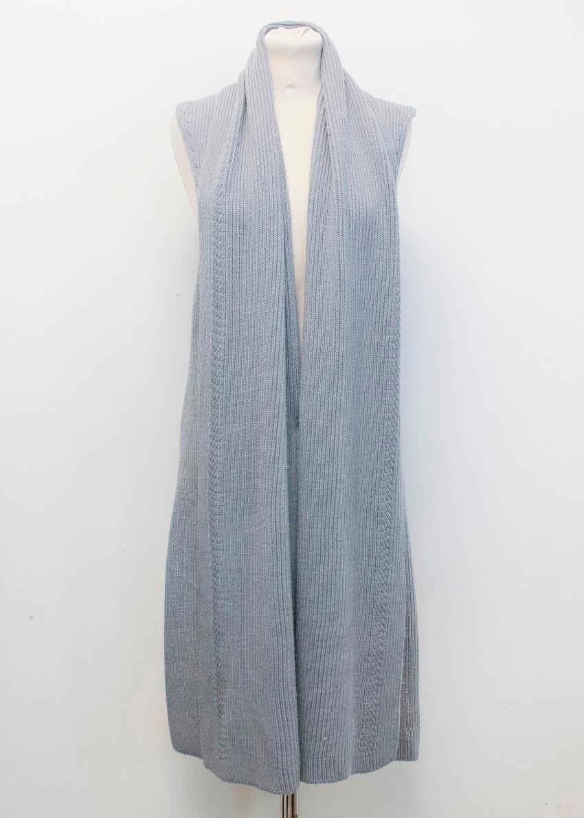 Missoni grey knit sleeveless cardigan. 

Features metallic finish detail on the lower half.

100% Wool

Size S

Approx.
Measurements are taken with the item lying flat, seam to seam.
Shoulder width: 36.5 cm
Length: 101 cm

