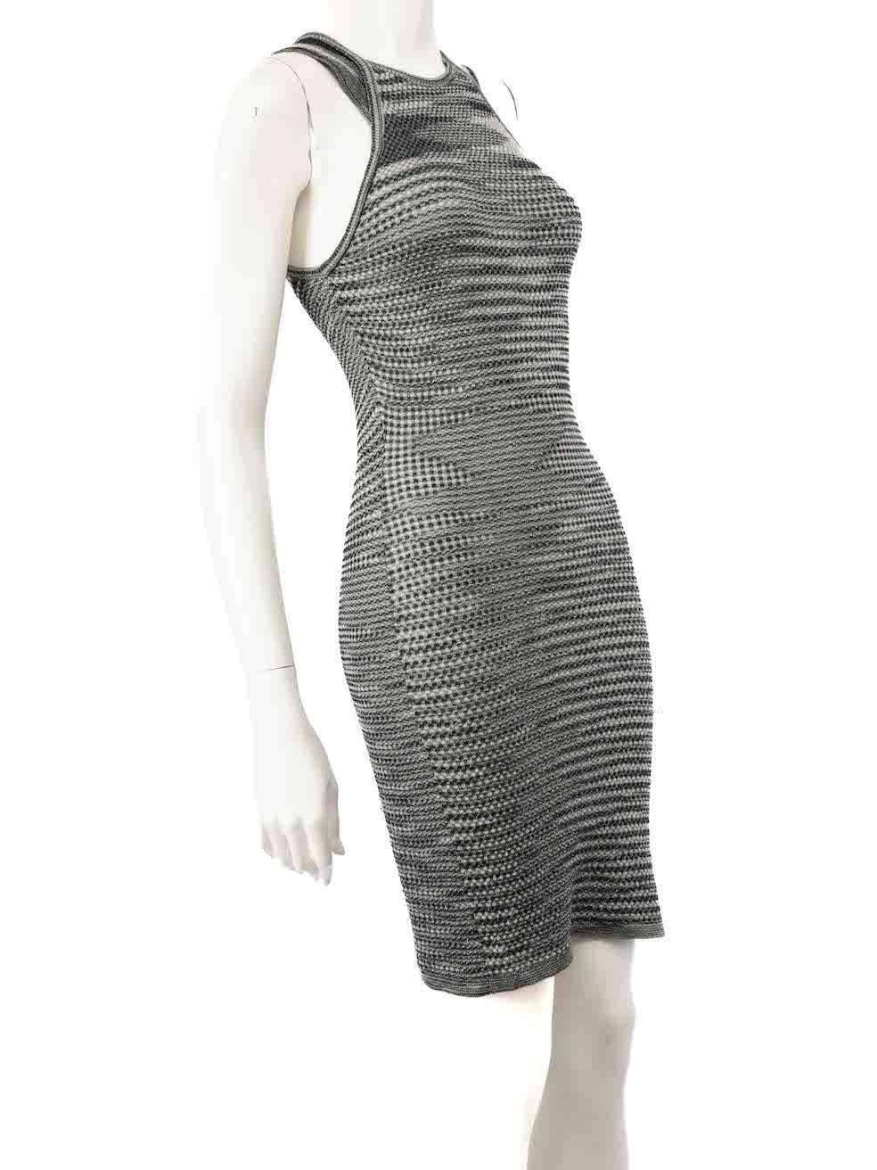 CONDITION is Very good. Minimal wear to dress is evident. Minimal pull thread around the hemline and front skirt area on this used Missoni designer resale item.
 
 
 
 Details
 
 
 Grey
 
 Wool
 
 Knee length dress
 
 Knitted and stretchy
 
 Striped