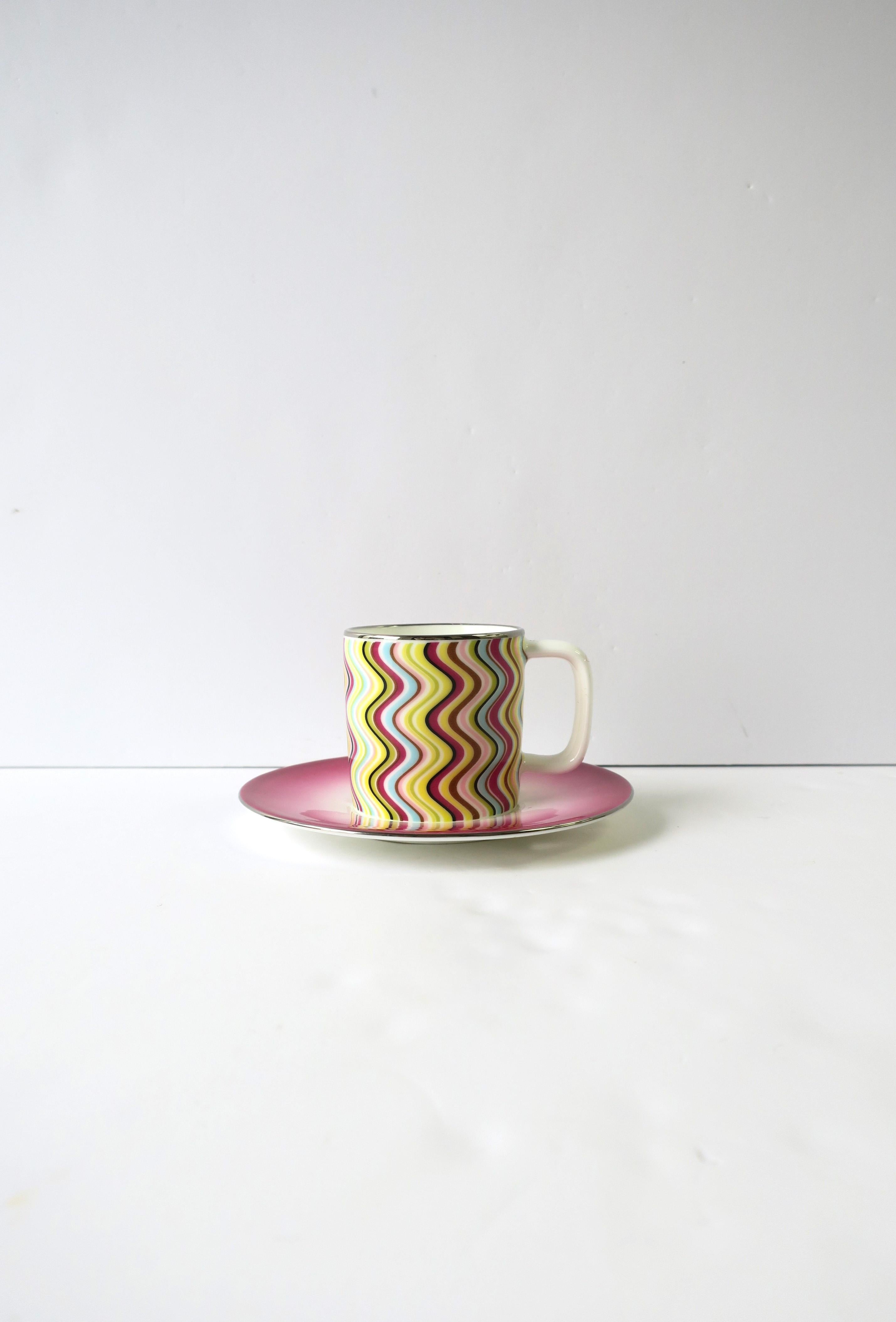 A beautiful colorful porcelain coffee espresso or demitasse tea cup and saucer from the iconic Italian luxury Maison Missoni, circa early 21st century, Italy. Colors include white porcelain, yellow, pink, red raspberry, light green, light blue and