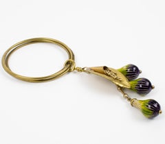 Missoni Italia Pulsera de metal dorado con colgantes de esmalte verde y morado