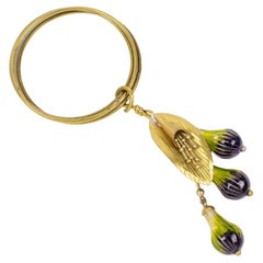 Bracciale Bangle in metallo dorato di Missoni Italia con charms in Greene & Greene