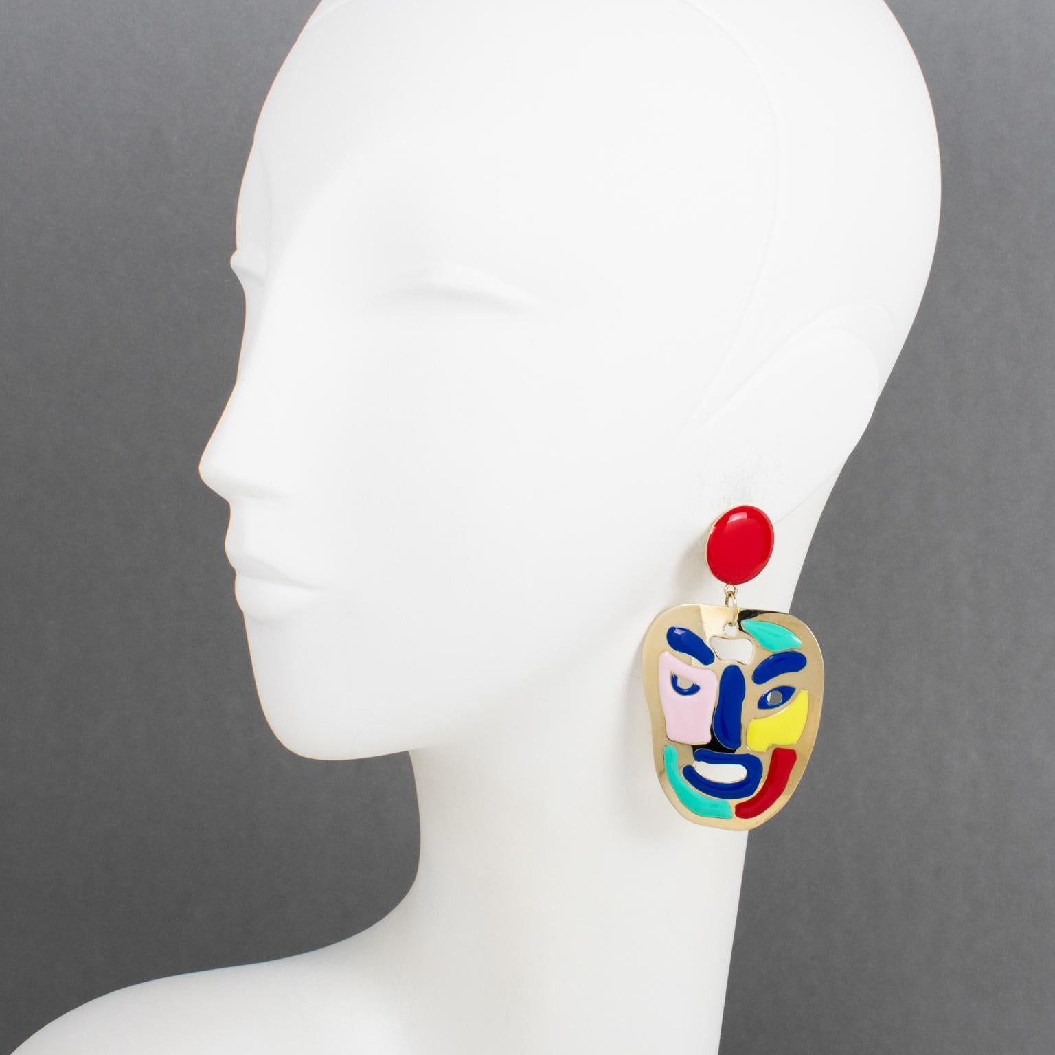 These are rare iconic Missoni, Italy couture clip-on earrings. Italian designer Rosita Missoni designed this iconic pattern in the 1980s, and these earrings were part of a 2000s design revival. They are adorned with playful smiling faces. The pieces