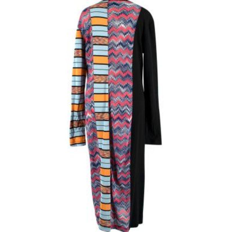 Missoni M Collection Panelled Zig Zag Knit Midi Dress

- Mid weight
- Blue and orange front stripe panel 
-Knitted blue and pink zig zag panels
- Black cotton sleeves and panels 
- Mid length
- Slim fitting 

Materials:
100% Cotton 

Made in Italy