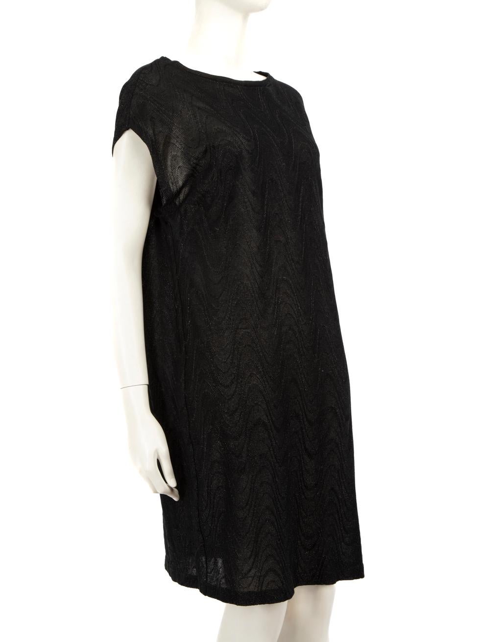 CONDITION is Very good. Hardly any visible wear to dress is evident on this used M Missoni designer resale item.
 
 Details
 
 
 Black
 
 Cotton
 
 Dress
 
 Knee-length
 
 Short sleeves
 
 Comes with a slip
 
 Stretchy
 
 Round neck
 
 
 
 
 
 Made