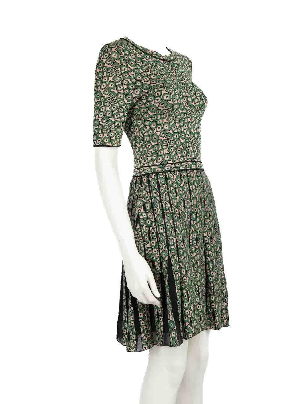 CONDITION is Very good. Hardly any visible wear to dress is evident on this used M Missoni designer resale item.
 
 
 
 Details
 
 
 Green
 
 Synthetic
 
 Knee length dress
 
 Abstract jacquard pattern
 
 Knitted and stretchy
 
 Round neckline
 
