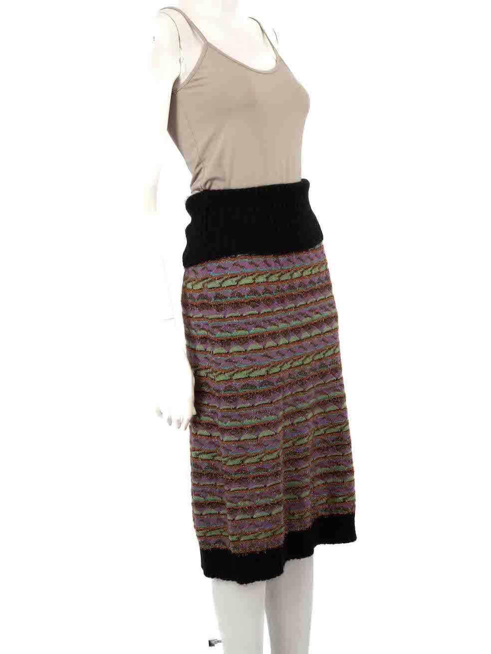 CONDITION is Very good. Hardly any visible wear to skirt is evident on this used M Missoni designer resale item.
 
 
 
 Details
 
 
 Multicolour - Purple, black and green
 
 Wool
 
 Knee length skirt
 
 Knitted and stretchy
 
 Patterned
 
 
 
 
 

