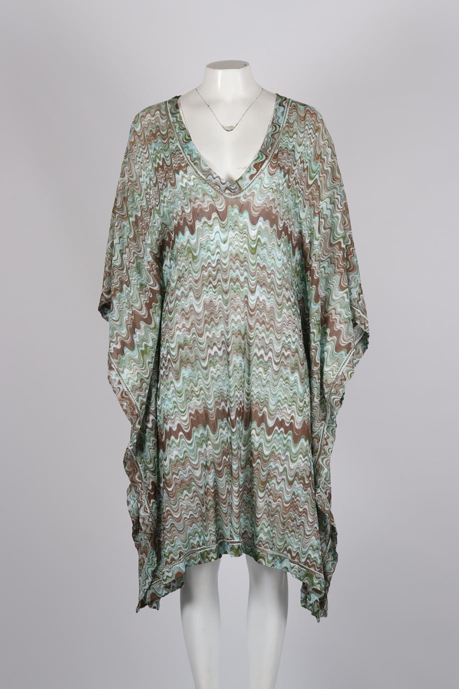 Missoni Mare Crochet Knit Kaftan. Multi. Short Sleeve. V-Neck. Slips on. 100% Rayon. Medium (UK 10, US 6, FR 38, IT 42). Bust: 34 in. Waist: 34 in. Hips: 48 in. Length: 40.5 in. Condition: Used. Very good condition - No sign of wear; see pictures