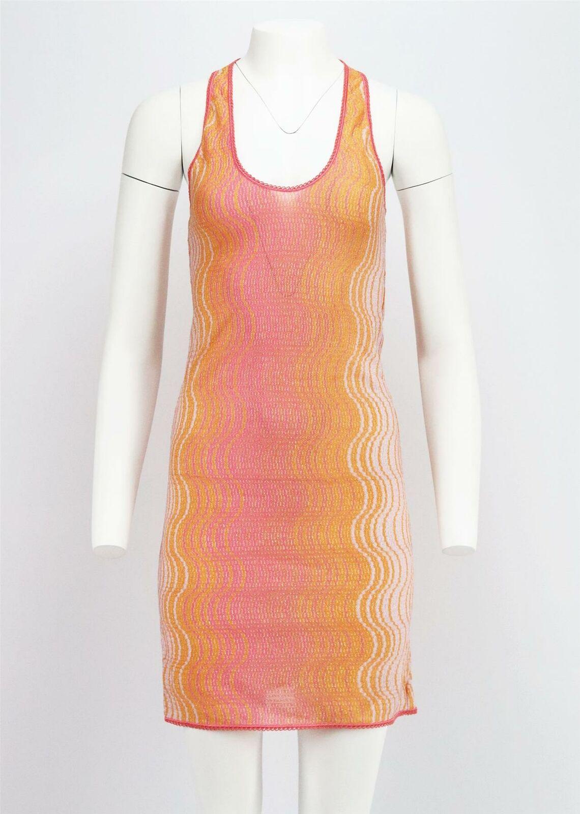 The distinctive patterns of Missoni Mare's crochet-knit pieces are universally recognizable, expertly spun in Italy, this mini dress has a figure-hugging silhouette that is slightly sheer.
Orange and pink crochet-knit.
Slips on. 50% Rayon, 32% rayon