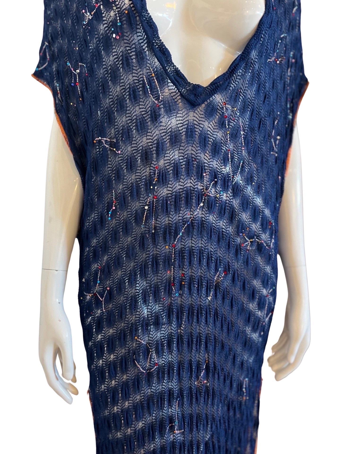 Missoni Mare navy knit kaftan with embroidered and beaded constellations over the front of the dress.  This is a very unique piece that I have never seen before with Missoni. 

The constellations are done with multi colored metallic thread and