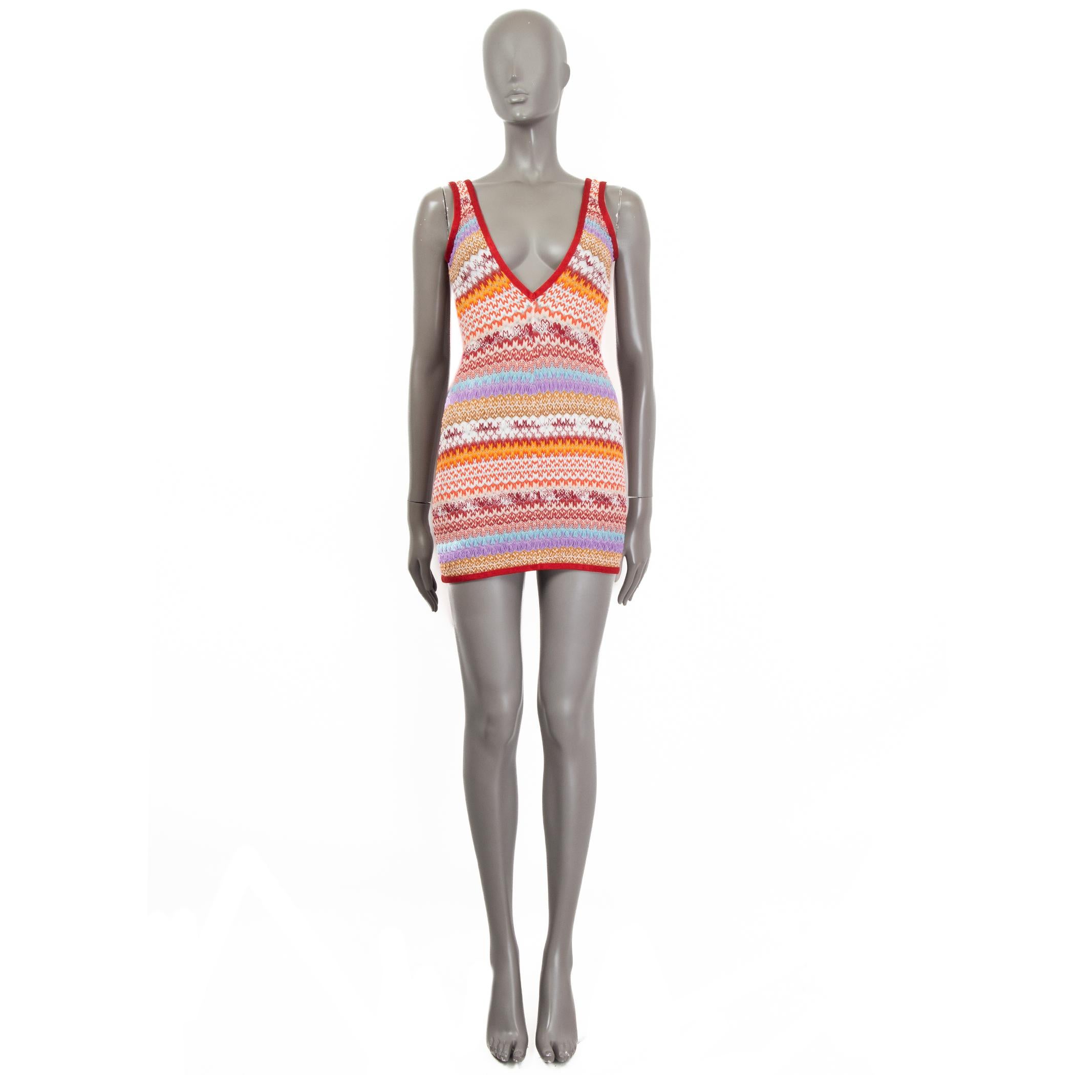 100% authentic Missoni Mare mini beach dress in blue, apricot, pink, light blue and off-white rayon (84%), nylon (11%) and elastane (5%). Features an open back. Unlined. Has been worn and is in excellent condition. 

Measurements
Tag