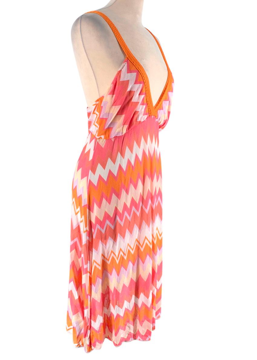 Missoni Mare Pink & Orange Chevron Print Knit Mini Dress 

-Made of lightweight knit 
-Gorgeous cheerful chevron pattern 
-Classic comfortable style 
-V shaped neckline 
-Open back design 
-Perfect for a sunny day 

Materials:
100% rayon 

Dry clean