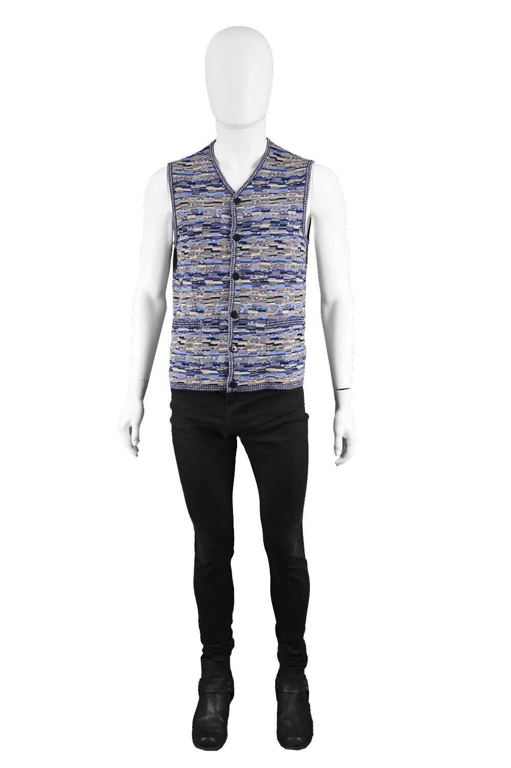 Missoni Men's Vintage Blue Wool & Silk Textured Knit Sleeveless Cardigan, 1990s 

Size: Marked 48 which is roughly a men's Small to Medium. Please check measurements.
Chest - 40” / 101cm
Waist - 38” / 96cm
Length (Shoulder to Hem) - 23” /