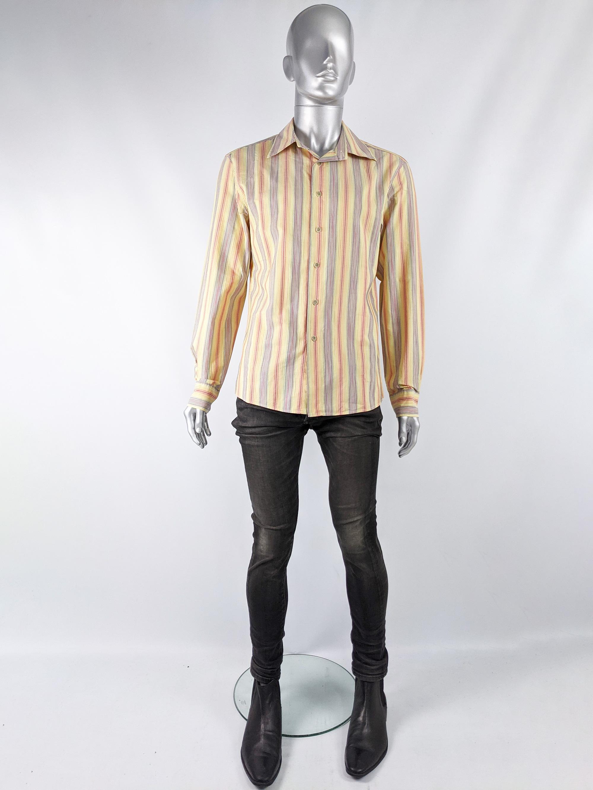 A stylish vintage mens long sleeved shirt from the late 90s by luxury Italian fashion house, Missoni for their Sport line. In a multicolored, striped cotton with a zig zag texture throughout and long sleeves.

Size: Marked IT 50 which equates to a