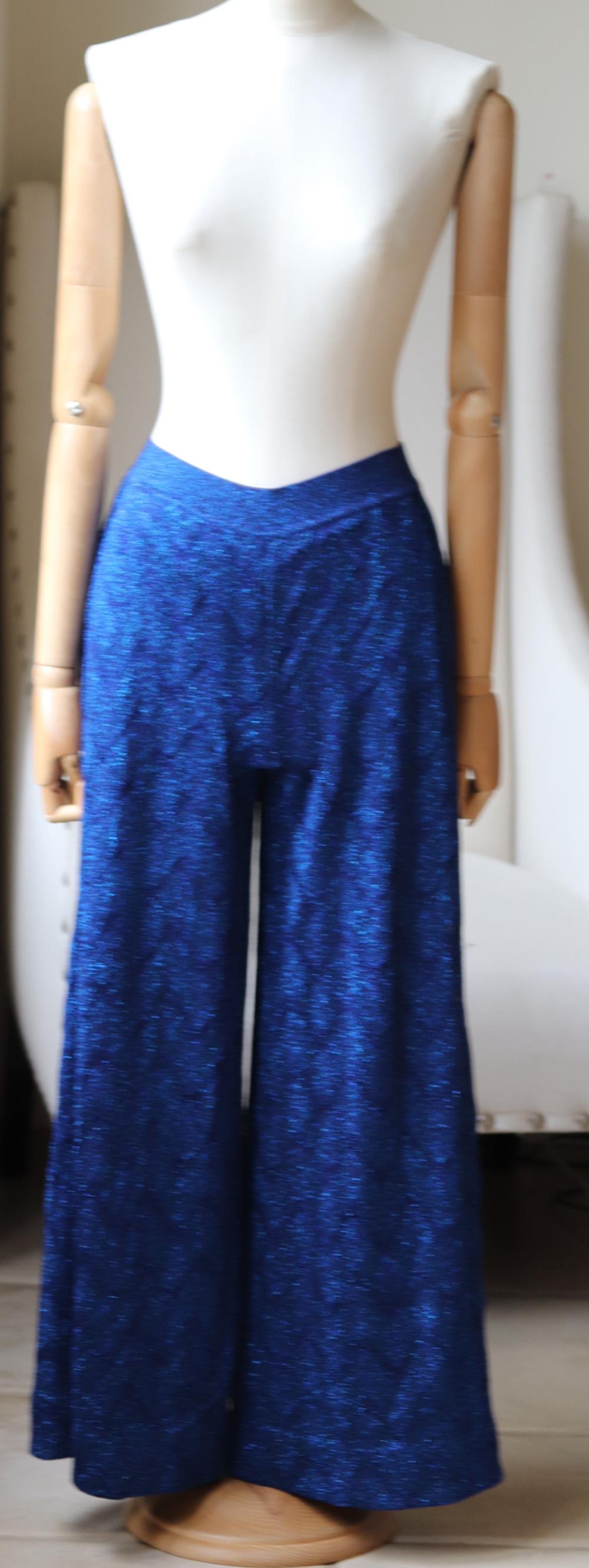 Missoni's pants are woven in the house's signature zig-zag pattern.
Finished with light-catching metallic threads, this pair has a cropped wide leg silhouette that will flatter and elongate your frame. 
Blue cupro, polyester and viscose blend.
Pull