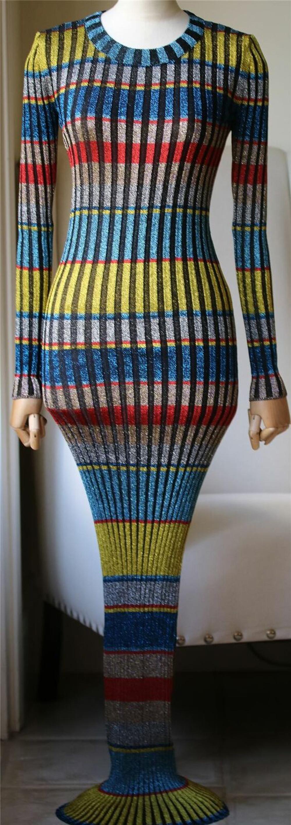 This Fall runway piece is knitted with contrasting metallic striped threads and cut for a close fit. Multicolored ribbed-knit. Slips on. 60% viscose, 25% cupro, 15% polyester. Made in Italy.

Size: IT 40 (UK 8, US 4, FR 36)

Condition: As new