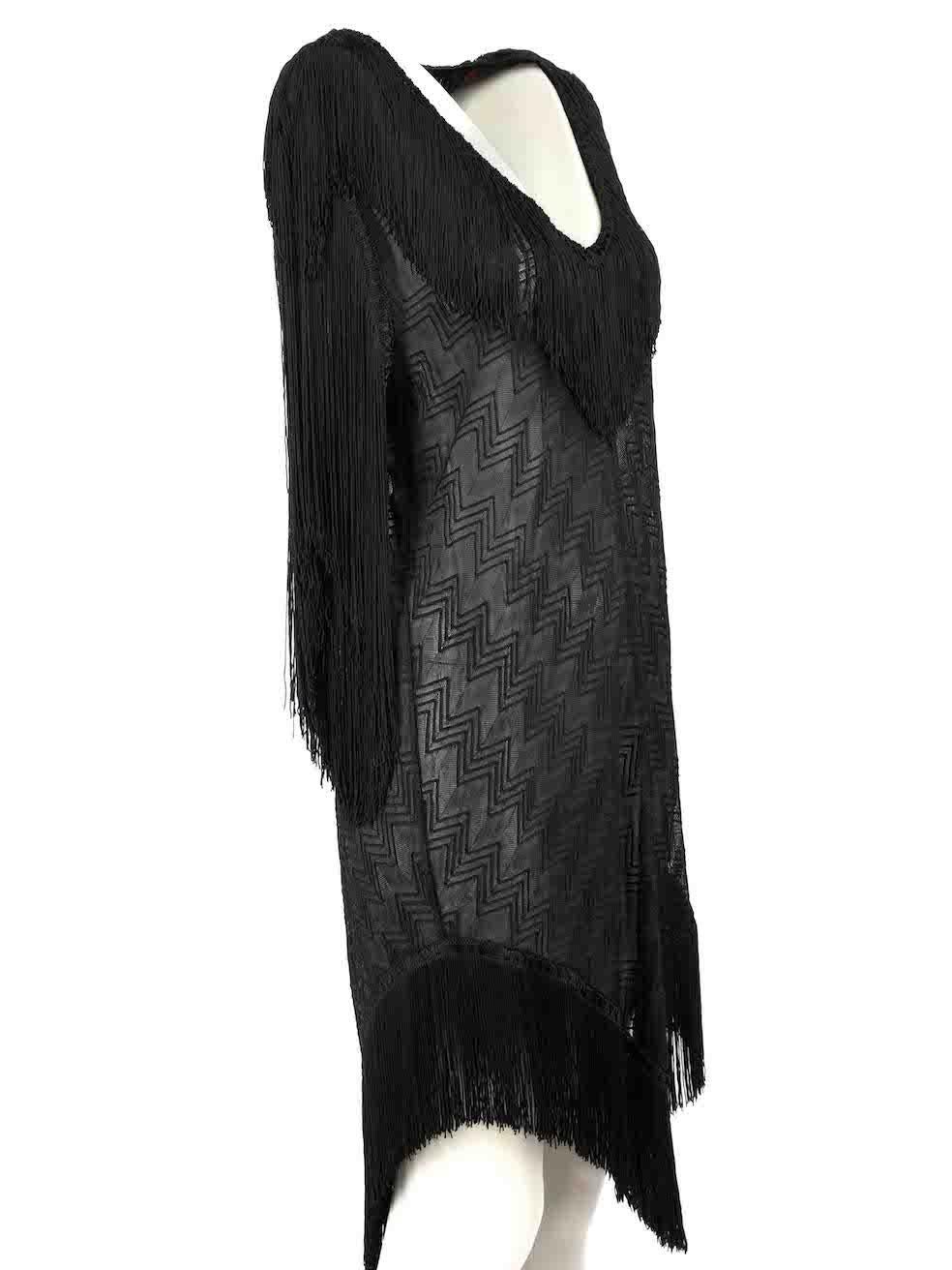 CONDITION is Very good. Hardly any visible wear to dress is evident on this used Missoni Mare designer resale item.
  
Details
Black
Synthetic
Beach cover up
Zig zag pattern
Fringed accent 
V neckline
Sheer
  
Made in Italy
 
Composition
NO