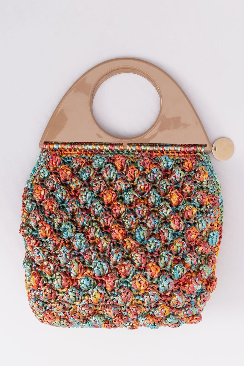 Missoni - Multi-color raffia bag, with bakelite handles and a magnetic lock. 

Additional information: 
Dimensions: Length: 34 cm (13.38