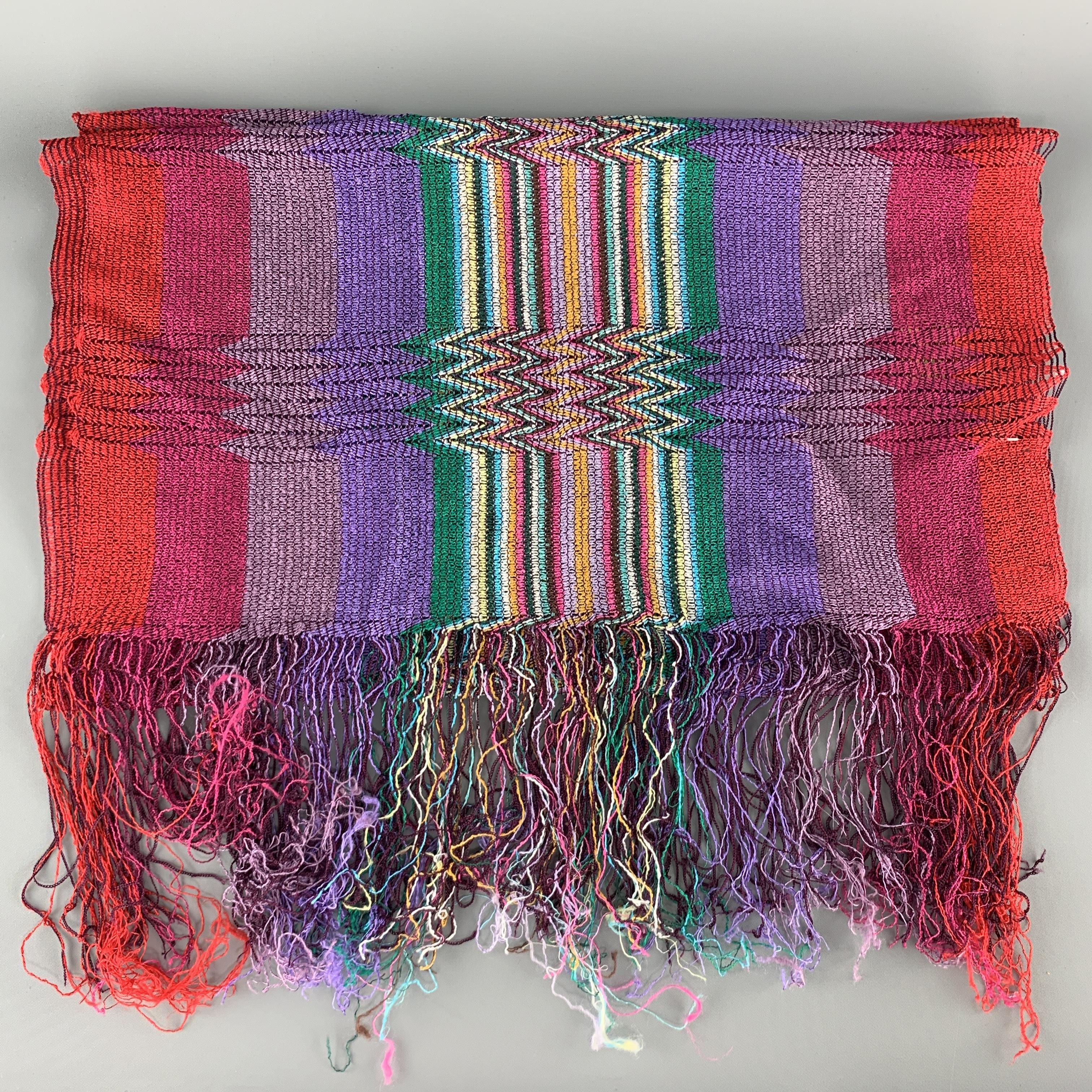 MISSONI scarf comes in multi color striped pleated textured viscose knit with fringe ends. Made in Italy.

Very Good Pre-Owned Condition.

88 x 20 in.