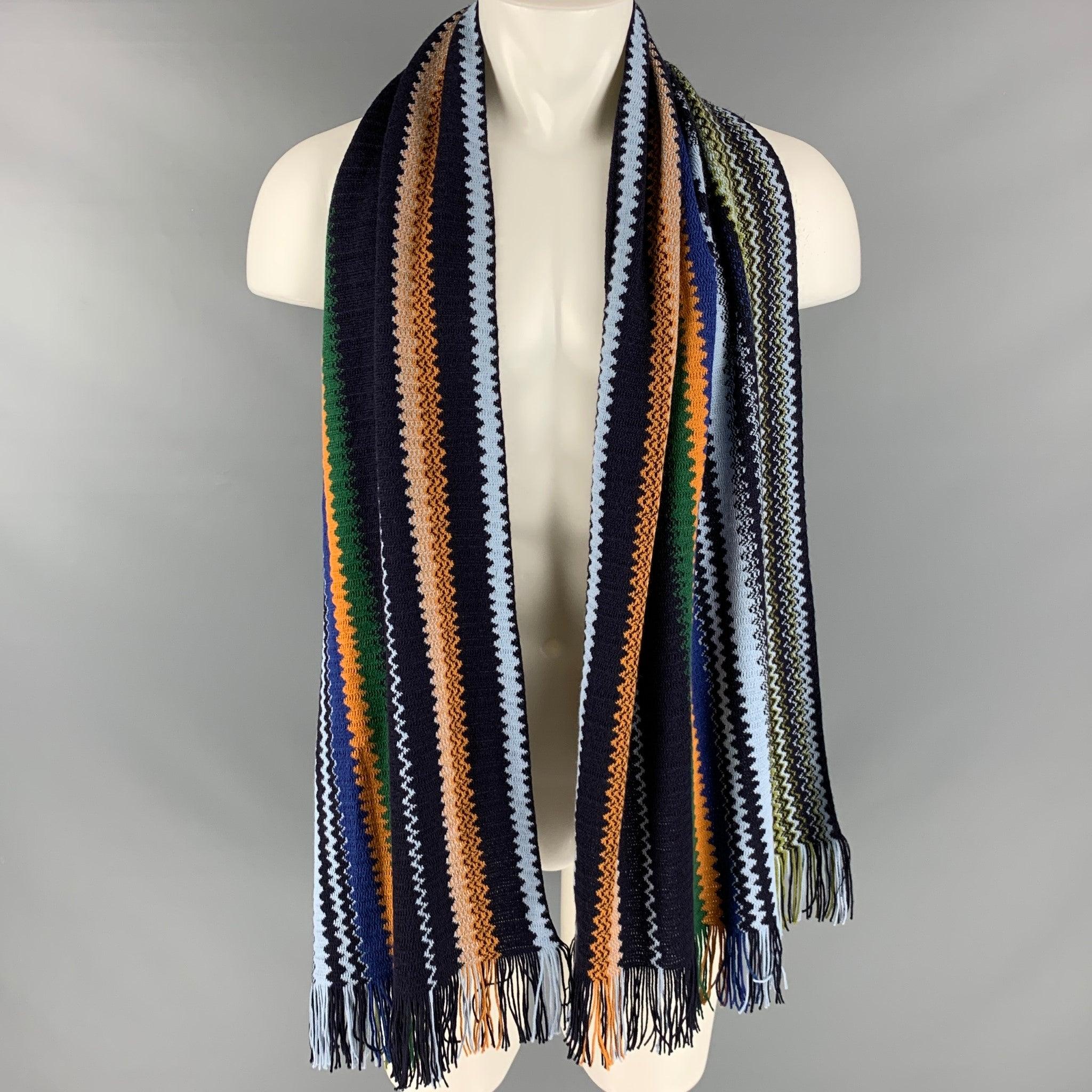 MISSONI
scarf in a multi-color wool blend knit fabric, featuring zig-zag pattern and fringe trim.Excellent Pre-Owned Condition. 

Measurements: 
  36 inches  x 18.5 inches 
  
  
 
Reference: 126323
Category: Scarves & Shawls
More Details
   