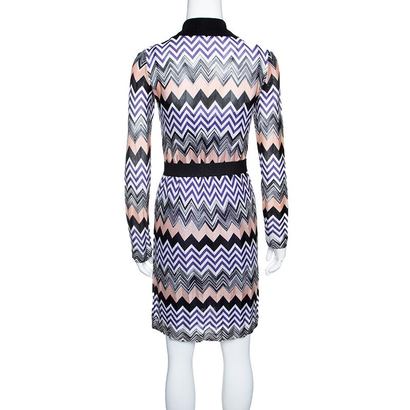 This multicoloured dress from Missoni is a gorgeous piece to don for your casual outings. Designed with long sleeves, it features a chevron pattern all over and a self-tie belt to highlight the waist. We like it with a pair of sneakers.

Includes: